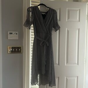 Tommy Hilfiger patterned lightweight dress. Black floral over nude. Size 10.